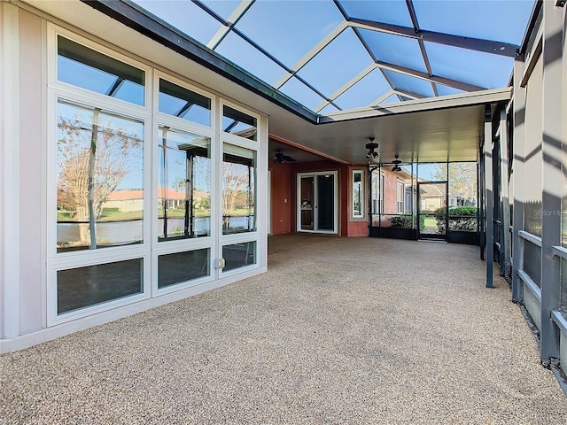 unfurnished sunroom with vaulted ceiling