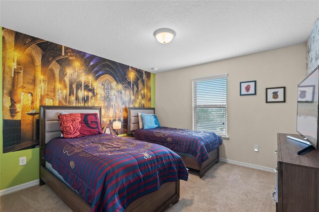 carpeted bedroom featuring a textured ceiling