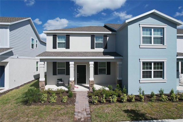 view of property with a front yard