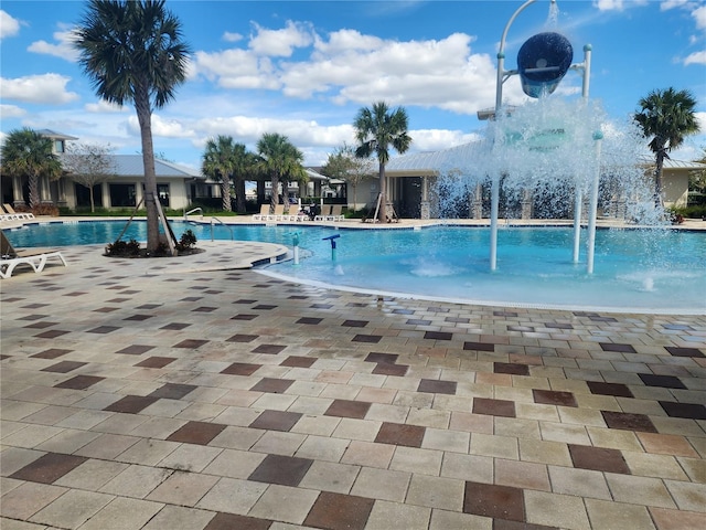 view of pool featuring pool water feature