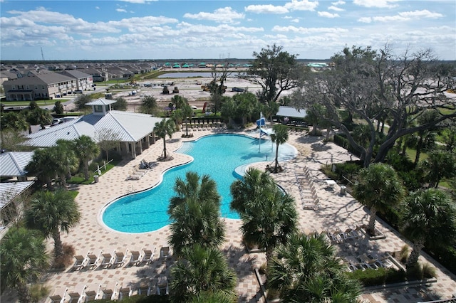 view of pool featuring a patio