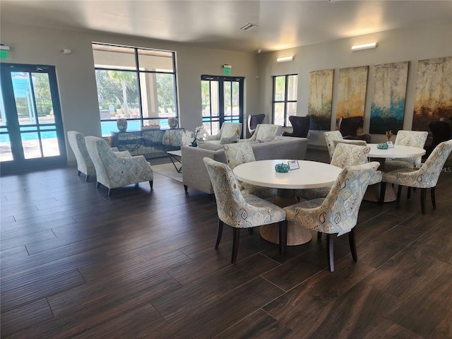 dining area featuring dark hardwood / wood-style floors