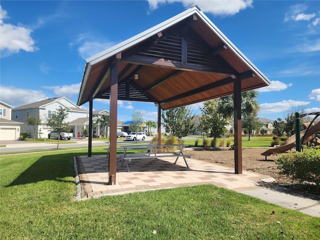 view of community with a yard and a gazebo