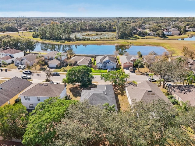 bird's eye view with a water view