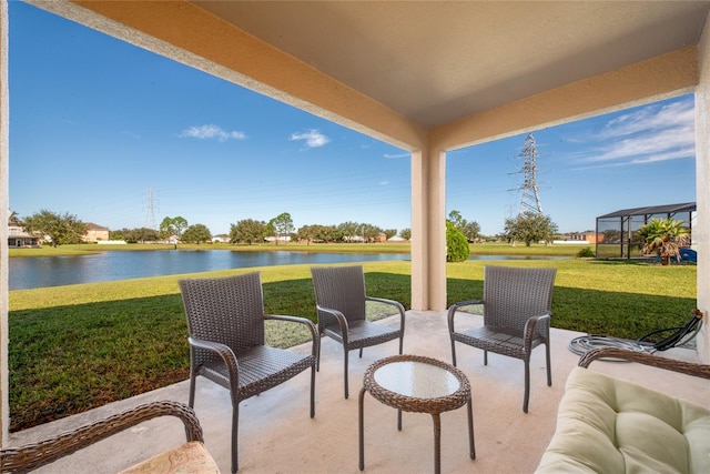 view of patio with a water view