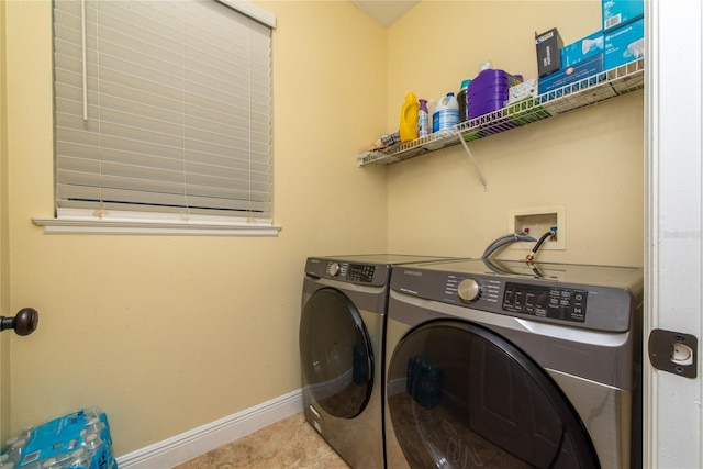 laundry room with washer and clothes dryer