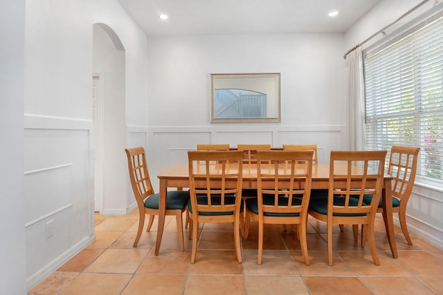 dining area with light tile patterned flooring