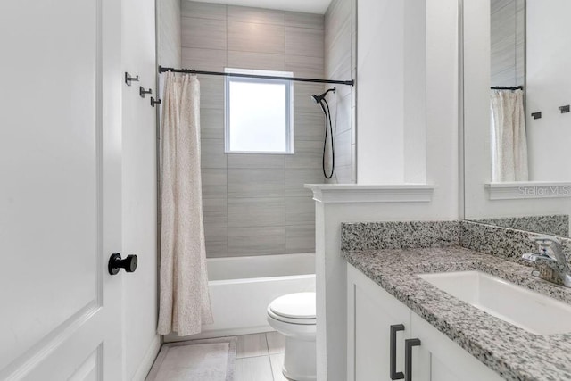 full bathroom featuring vanity, shower / tub combo, toilet, and tile patterned flooring