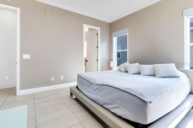 tiled bedroom featuring crown molding