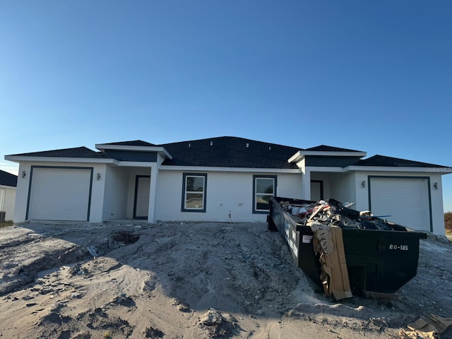 view of front of home with a garage