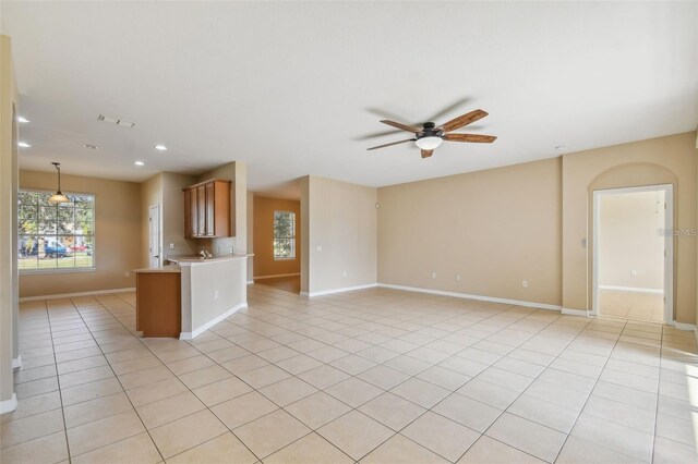 interior space with light tile patterned flooring, visible vents, baseboards, recessed lighting, and a ceiling fan