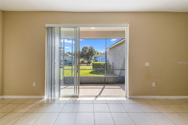 empty room with light tile patterned floors