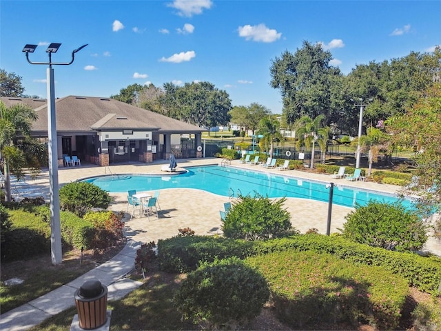 view of pool featuring a patio area