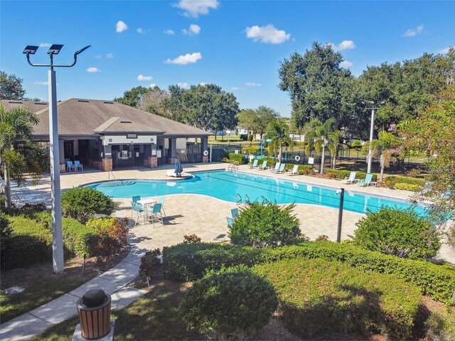 pool with a patio