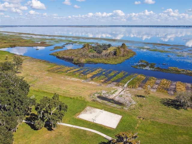 drone / aerial view with a water view