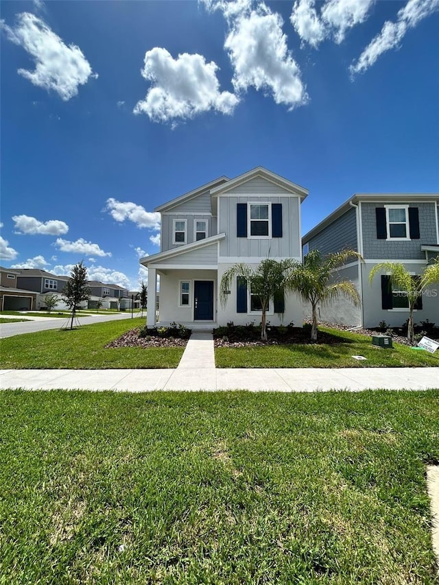 view of front of home with a front lawn