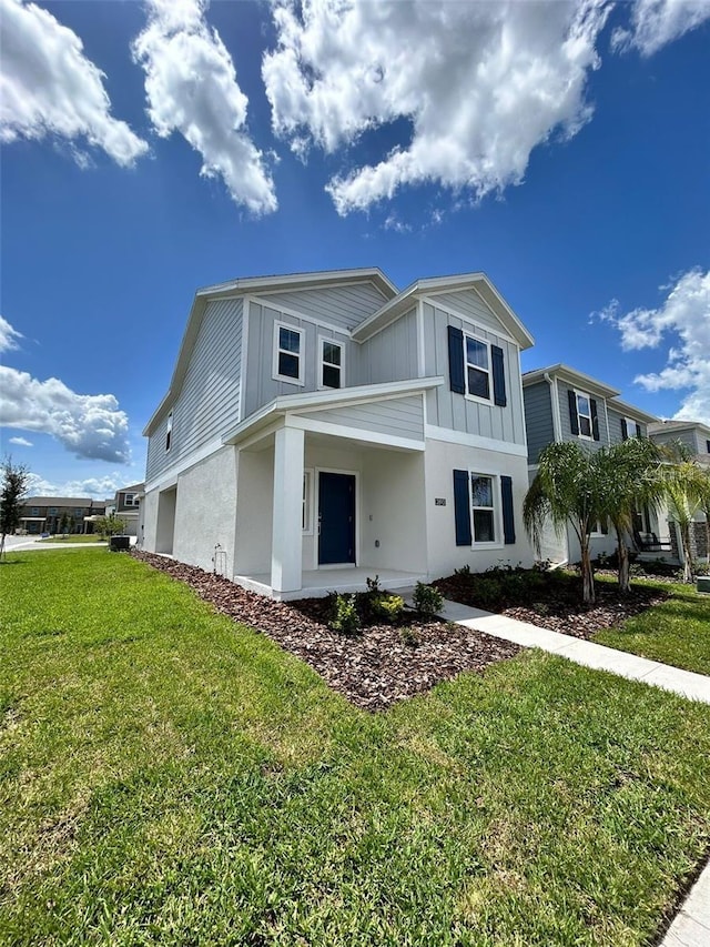 view of front of home with a front lawn