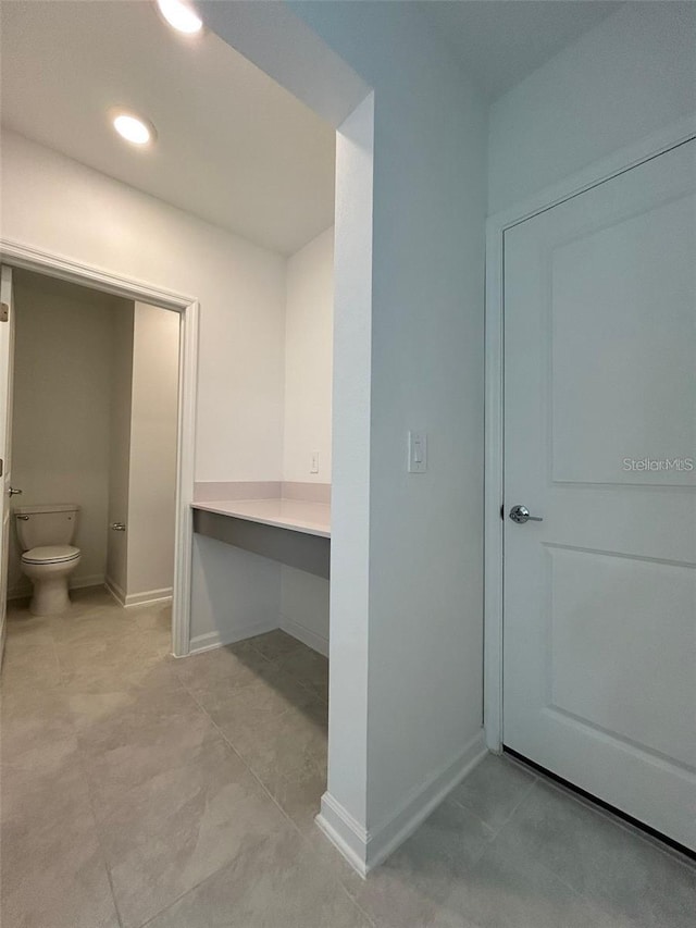 bathroom featuring toilet