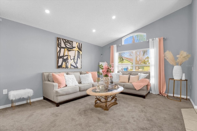 carpeted living room featuring a textured ceiling and high vaulted ceiling