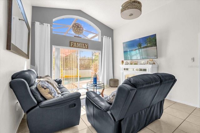 living room featuring light tile patterned floors and vaulted ceiling