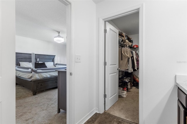 bathroom with vanity and a textured ceiling