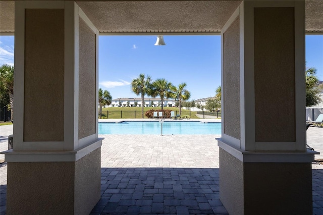 view of swimming pool with a patio area