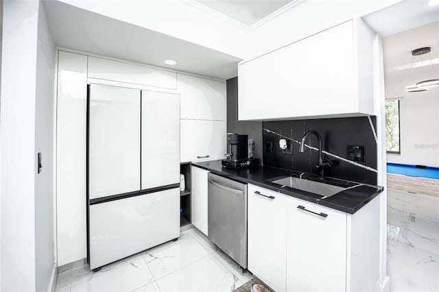 kitchen with refrigerator, a sink, white cabinets, marble finish floor, and dishwasher