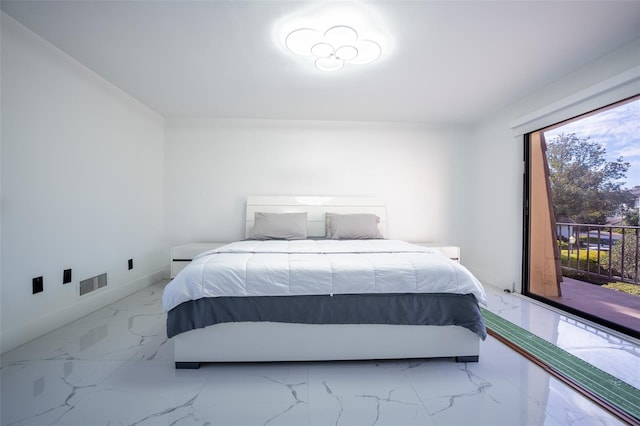 bedroom with marble finish floor, access to outside, visible vents, and baseboards