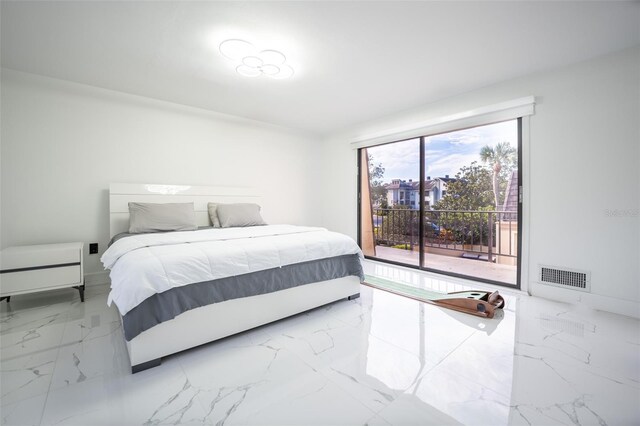 bedroom featuring access to exterior, marble finish floor, and visible vents