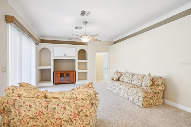 living room featuring crown molding, light colored carpet, built in features, and ceiling fan