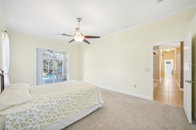 carpeted bedroom with ceiling fan and access to exterior