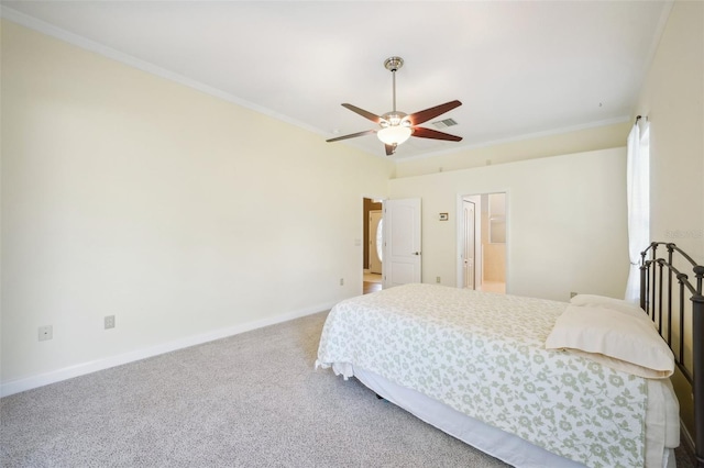 bedroom featuring crown molding, carpet, and ceiling fan