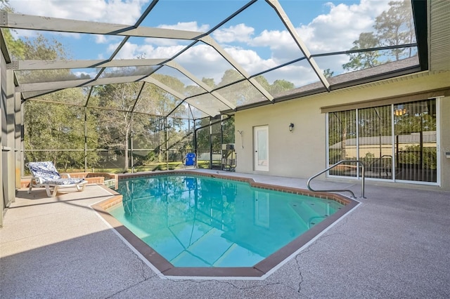 view of pool featuring a patio area and a lanai