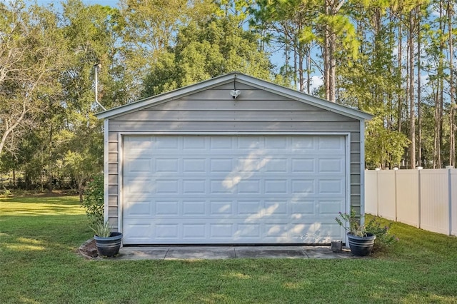 garage with a lawn