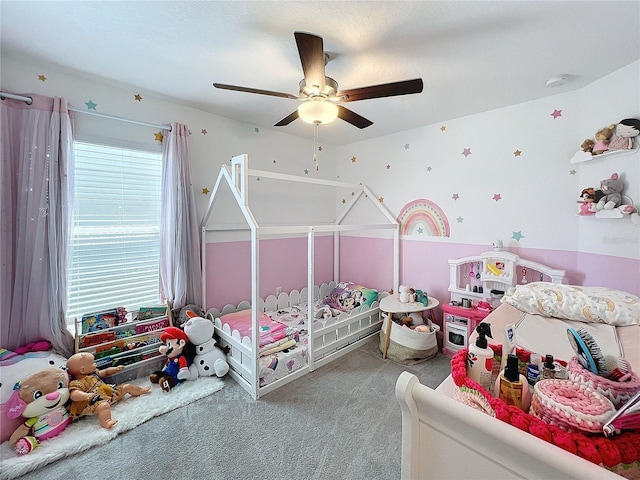 carpeted bedroom featuring ceiling fan