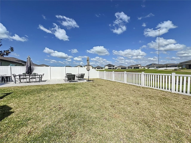 view of yard with a patio area