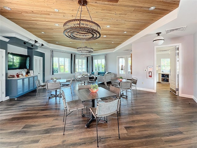 dining area featuring french doors, wooden ceiling, dark hardwood / wood-style floors, and a notable chandelier