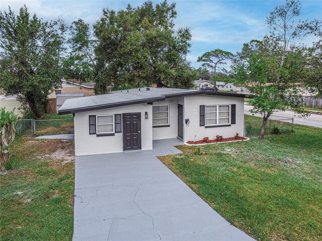 view of front of home with a front yard