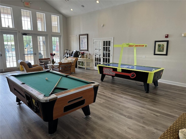 playroom featuring french doors, high vaulted ceiling, and hardwood / wood-style floors