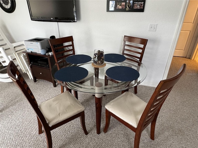 dining area with carpet flooring