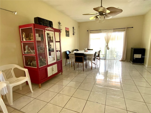 tiled dining room with ceiling fan