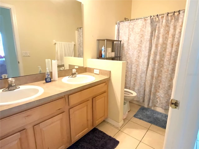 bathroom with vanity, toilet, a shower with curtain, and tile patterned flooring