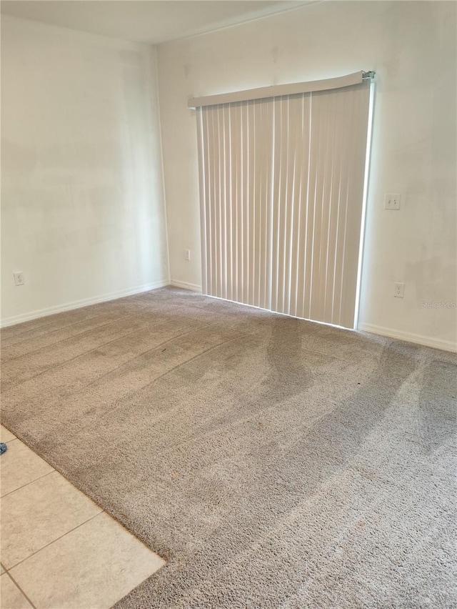 spare room with carpet flooring