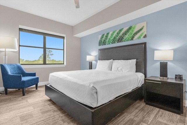 bedroom featuring light hardwood / wood-style floors and ceiling fan