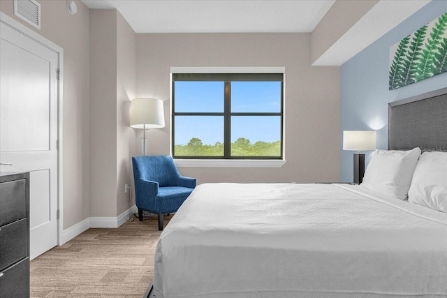 bedroom with light hardwood / wood-style floors