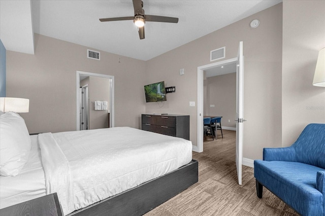 bedroom with ceiling fan and light hardwood / wood-style floors