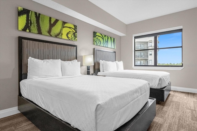 bedroom featuring dark hardwood / wood-style flooring