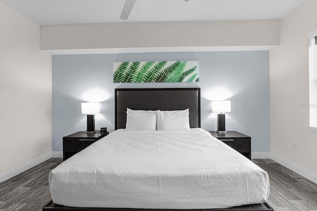 bedroom featuring dark hardwood / wood-style floors and ceiling fan