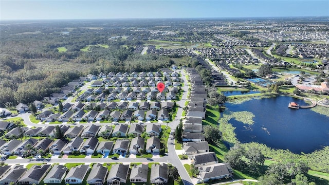 drone / aerial view with a water view