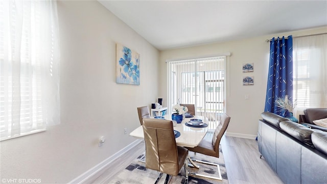 dining room featuring light wood-type flooring